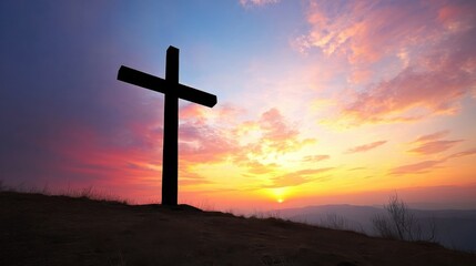 Silhouette of a wooden cross standing on a hilltop at sunset, overlooking a mountain range with a vibrant, colorful sky. : Generative AI