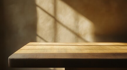 Empty wooden table bathed in warm sunlight