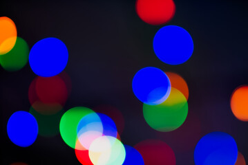 Lens blurred christmas lights looking like round colorful blobs