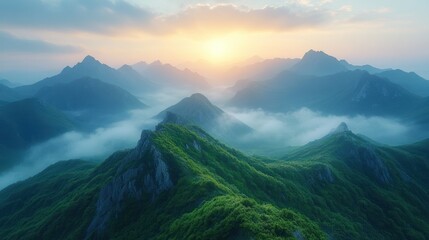 Misty mountain range at sunrise. Lush green hills, hazy atmosphere, golden light