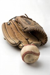 Worn baseball glove and ball on white background