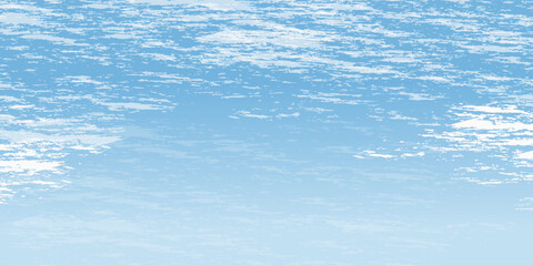 clear blue sky with a few clouds. The sky is very bright and the clouds are scattered throughout