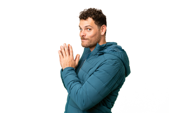 Brazilian man over isolated chroma key background scheming something