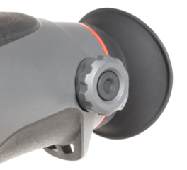 Closeup quartering view of the focus knob on a night vision monocular