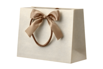 Luxury gift paper bag gift bag with handles and gold bow ribbon. isolated transparent background. 
