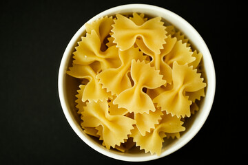 Single Bowl Of Uncooked Italian Healthy Farfalle Pasta