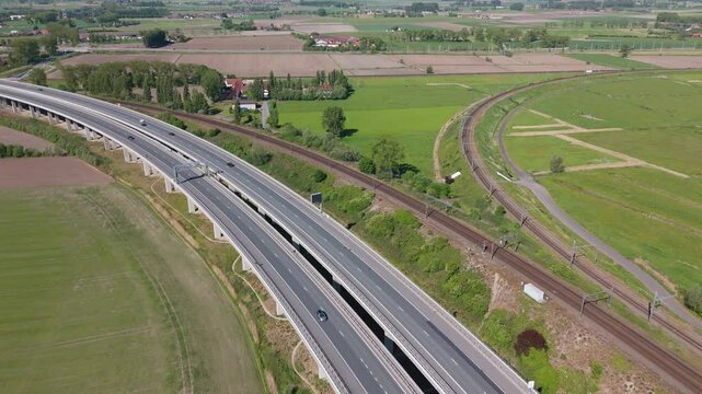 Clear Aerial of A11 Highway and Surrounding Waterway | FlyLens 4K
