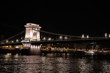 Obraz premium Night view of the bridge over the Danube in Budapest. Horizontal photo