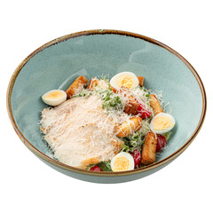 Isolated portion of gourmet caesar salad with shrimp