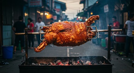 Naklejka premium Whole lechon roasted on charcoal spit in urban street with people watching background scene