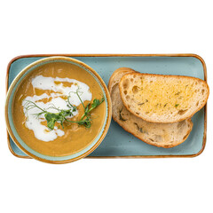 Portion of gourmet restaurant yellow pea soup