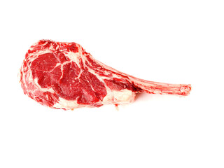 Fancy raw tomahawk beef steak on white background. High quality and top price red meat on the bone...