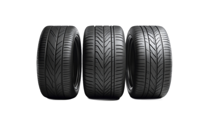 A close-up view of three distinct car tires showcasing varying tread patterns and wear levels, set against a clean, neutral background, ideal for automotive product promotion or analysis