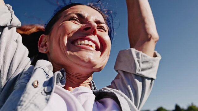 Jubilant soccer mom celebrating son's triumphant moment, radiating pure happiness and pride during victorious sporting event