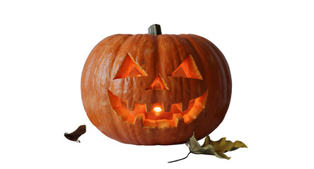 A traditional carved Halloween jack o lantern pumpkin with a glowing light source inside, illuminating its spooky face with triangular eyes and a jagged smile.