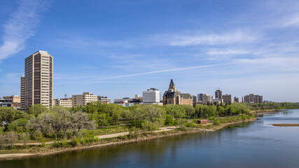 Fototapeta premium View of North bank on the South Saskatchewan River flowing through Saskatoon, Canada