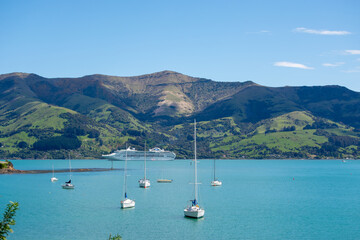 Sailboats in a Tranquil Coastal Bay