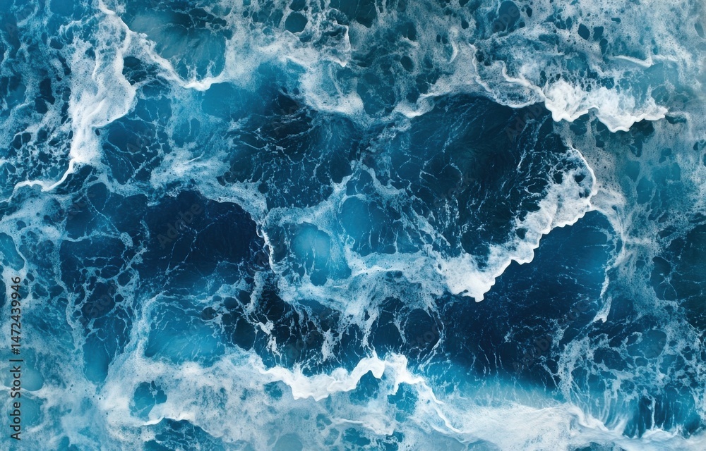 Poster Aerial view of ocean waves with white foam and deep blue water, creating a textured surface pattern. : Generative AI