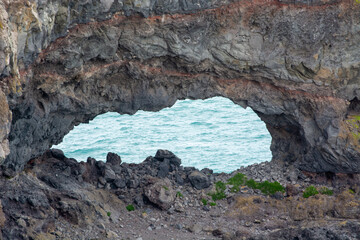 Natural Rock Arch Overlooking Ocean