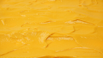 Yellow sauce splashes as a background.