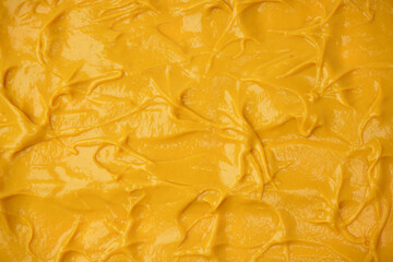 Yellow sauce splashes as a background.