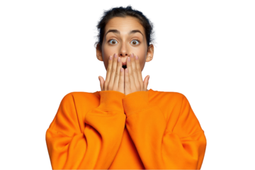 Astonished woman in orange sweatshirt shocked expression closeup portrait studio shot amazement surprise reaction facial on transparent background
