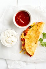 Quesadilla with roasted chicken breast, vegetables and cheese