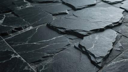 Textured arrangement of dark grey slate tiles with natural white veins and irregular edges