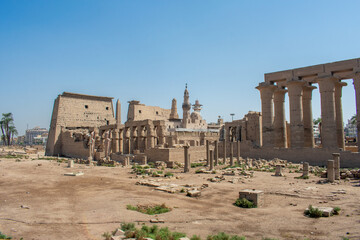 Karnak Temple in Luxor, Egypt. Entrance and Avenue of Sphinxes. Temple complex of Ancient Egypt in honor of the god Amun-Ra