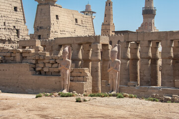 Karnak Temple in Luxor, Egypt. Entrance and Avenue of Sphinxes. Temple complex of Ancient Egypt in honor of the god Amun-Ra