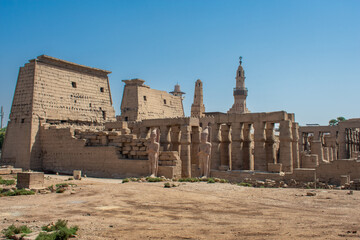 Karnak Temple in Luxor, Egypt. Entrance and Avenue of Sphinxes. Temple complex of Ancient Egypt in honor of the god Amun-Ra