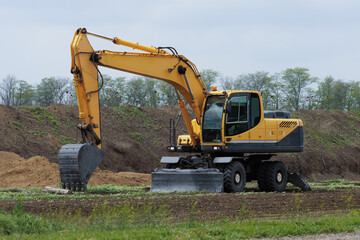 Professional construction equipment. Excavator. Equipment for digging earth and laying pipelines