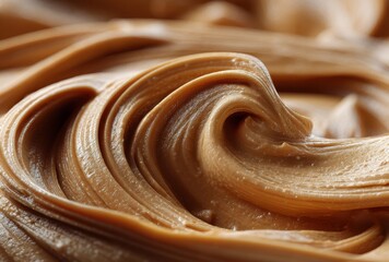 Creamy and Smooth Peanut Butter Close-Up with Rich Texture and Swirling Patterns Ideal for Culinary and Food Photography Projects