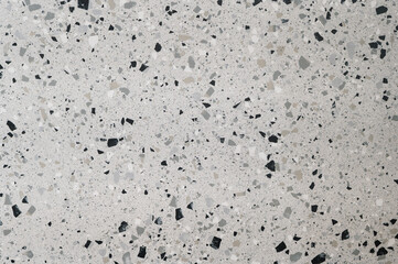 Terrazzo stone surface with gray and black fragment pattern for modern interior design