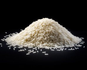 Basmati rice forming a pile on a black reflective surface