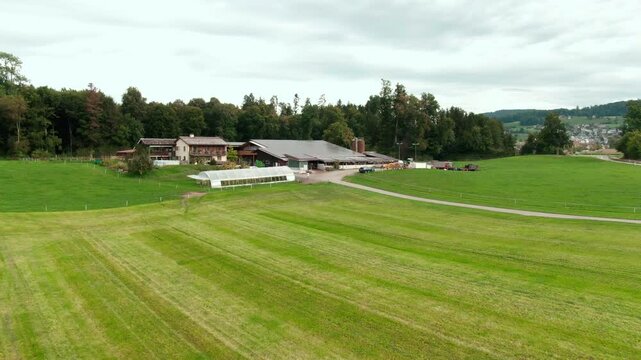 Drone View of a Modern Farm in Europe &ndash; Aerial Footage of Agricultural Buildings and Farmland