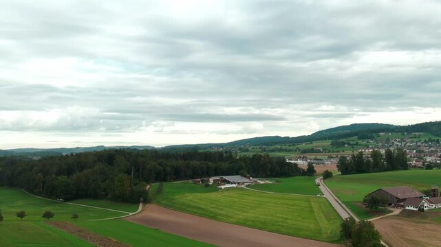 Drone View of a Modern Farm in Europe &ndash; Aerial Footage of Agricultural Buildings and Farmland