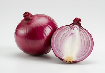 Isolated against a white backdrop, a raw, organic red onion, a healthy vegetable and flavorful food ingredient, is captured in a closeup
