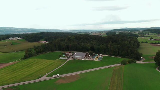 Drone View of a Modern Farm in Europe &ndash; Aerial Footage of Agricultural Buildings and Farmland