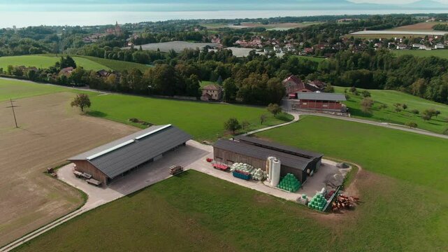 Drone View of a Modern Farm in Europe &ndash; Aerial Footage of Agricultural Buildings and Farmland