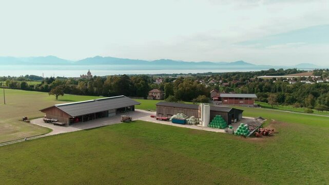 Drone View of a Modern Farm in Europe &ndash; Aerial Footage of Agricultural Buildings and Farmland