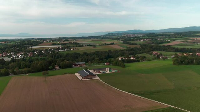 Drone View of a Modern Farm in Europe &ndash; Aerial Footage of Agricultural Buildings and Farmland
