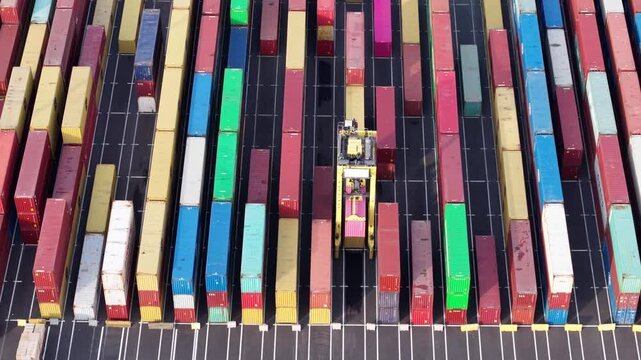 Colorful container port operations in zeebrugge showcase logistics and shipping efficiency