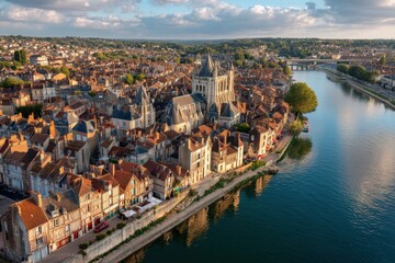 Fototapeta premium Panoramic Perspective of Historic Auxerre: Charming River, Architectural Marvels, and Picturesque Streets in France