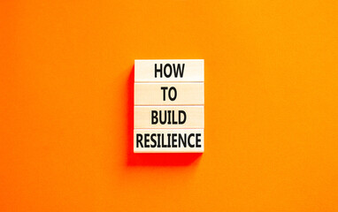 How to build resilience symbol. Concept words How to build resilience on beautiful wooden blocks....