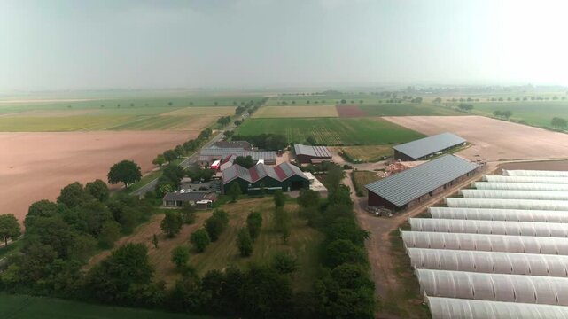 Drone Footage of Greenhouses on a Modern Farm in Europe &ndash; Aerial View of Agricultural Production