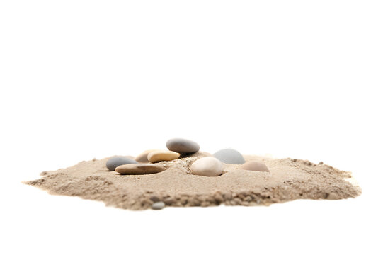 Smooth stones resting on a small pile of light brown sand against a black background