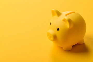 Piggy bank as a financial conceptual background with coins, doing business