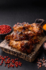 Grilled chicken wings in teriyaki sauce. Hot spicy takeaway food