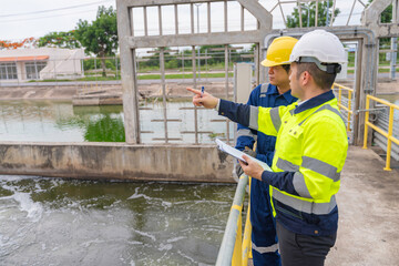 Environmental engineers work at wastewater treatment plants,Water supply engineering working at...